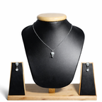 Elegant design &nbsp; A delicate silver chain with a brilliant round-cut diamond pendant, paired with matching diamond stud earrings for timeless sophistication.